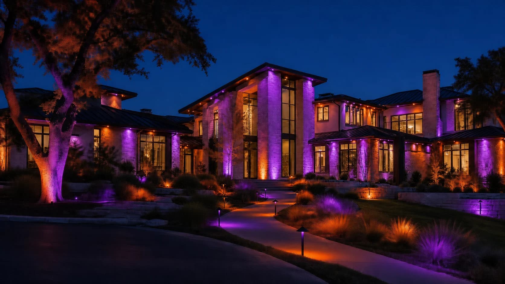 Fictional luxury home with synchronized orange and purple landscape and roofline lighting